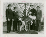 Sports - E.W. McKee, Howard Fanigan, Caption of Navy crew team and Christy Walsh with trophies and stuffed goat