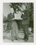 Sports - Man handing other man certificate