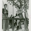 Sports - Archery - Woman in costume and man with bows and arrows