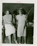 Sports - Archery - Two women with trophy and bow