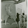 Sports - Archery - Two women aiming at heart shaped targets and man
