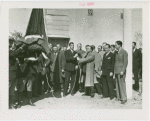 Sports - Banner - Group of men raising flag