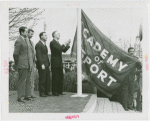 Sports - Banner - Group of men raising Academy of Sport flag