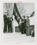 Sports - Banner - Group of men raising Navy flag