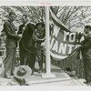Sports - Banner - Group of men and boy scouts raising New York Giants flag