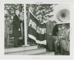 Sports - Banner - Group of men raising flag