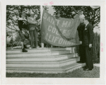 Sports - Banner - Group of men raising Saint Mary's College of California flag
