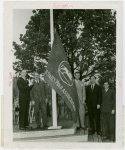 Sports - Banner - Group of men raising United States Polo Association flag