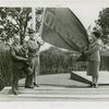 Sports - Banner - Two women and man raising Oregon flag