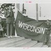 Sports - Banner - Three men raising Wisconsin flag