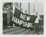 Sports - Banner - Group of men raising New Hampshire flag
