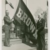Sports - Banner - Tuss McLaughry and Ralph Palmer raising Brown University flag