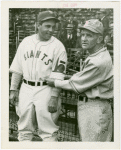 Sports - Baseball - Bill Terry showing Trylon and Perisphere emblem to Casey Stengel