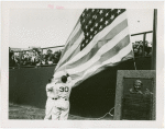 Sports - Baseball - Two baseball players raising flag