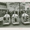 Sports - Baseball - Joe McCarthy, Bump Hadley and Jake Powell pushing their guides in pushcarts