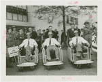 Sports - Baseball - Joe McCarthy, Bump Hadley and Jake Powell pushing their guides in pushcarts