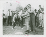 Sports - Baseball - Gene Desautels showing boys how to catch while Joe Cronin shows boy how to bat