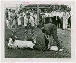 Sports - Baseball - Dell Young teaching boy how to tag
