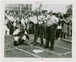 Sports - Baseball - Ernie Quigley, Moose McCormack and Morrie Arnovich teaching boy how to bat