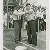 Sports - Baseball - Morrie Arnovich teaching boy how to bat