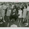 Sports - Baseball - Ernie Lombardi showing girls how to catch