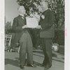 Sports - Baseball - Man receiving varsity letter certificate from other man