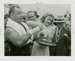 Sports - Boxing - Tony Galento receiving glass of milk from woman