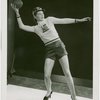 Sports - Football - Woman in Trylon and Perisphere sweater throwing football