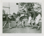 Sports - Football - Boys running into football players