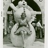 Sports - Ice Skating - Woman in ice skates posed with snowman