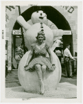 Sports - Ice Skating - Woman in ice skates posed with snowman