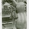 Sports - Ice Skating - Woman in ice skates posed with snowman