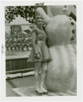 Sports - Ice Skating - Woman in ice skates posed with snowman