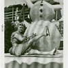 Sports - Ice Skating - Woman in ice skates posed with snowman