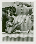 Sports - Ice Skating - Woman in ice skates posed with snowman