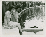 Sports - Miniature Boat Racing - Two girls with model boat