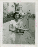 Sports - Miniature Boat Racing - Girl with model sailboat