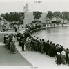 Sports - Miniature Boat Racing - Crowd watching model boat in water