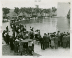 Sports - Miniature Boat Racing - Crowd watching model boat in water