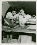 Sports - Miniature Boat Racing - Two girls with model boat