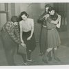 Sports - Self-Defense - Women demonstrating how hold on to purse when being mugged and how to get out of a neck hold when being attacked
