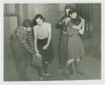 Sports - Self-Defense - Women demonstrating how hold on to purse when being mugged and how to get out of a neck hold when being attacked