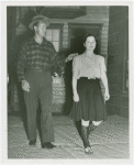 Sports - Self-Defense - Man tapping woman on shoulder