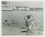 Sports - Waterskiing - Man and woman preparing to water-ski