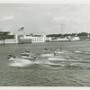 Sports - Waterskiing - Men on water-skis with women on their shoulders