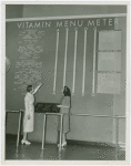Standard Brands - Exhibits - Women looking at Vitamin Menu Meter