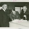Sweden Participation - Men looking at model of Hall of Nations