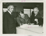 Sweden Participation - Men looking at model of Hall of Nations