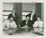 Sweden Participation - Grover Whalen signing contract with officials