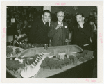 Swift Co. Participation - Charles Swift and Grover Whalen looking at model
